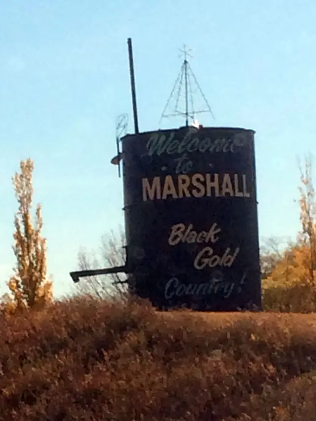 Welcome to Marshall sign on old tank